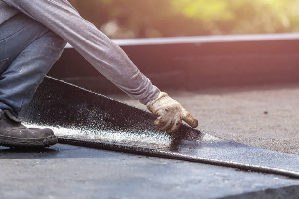 Professional Waterproofing technician working in Auburn, NY